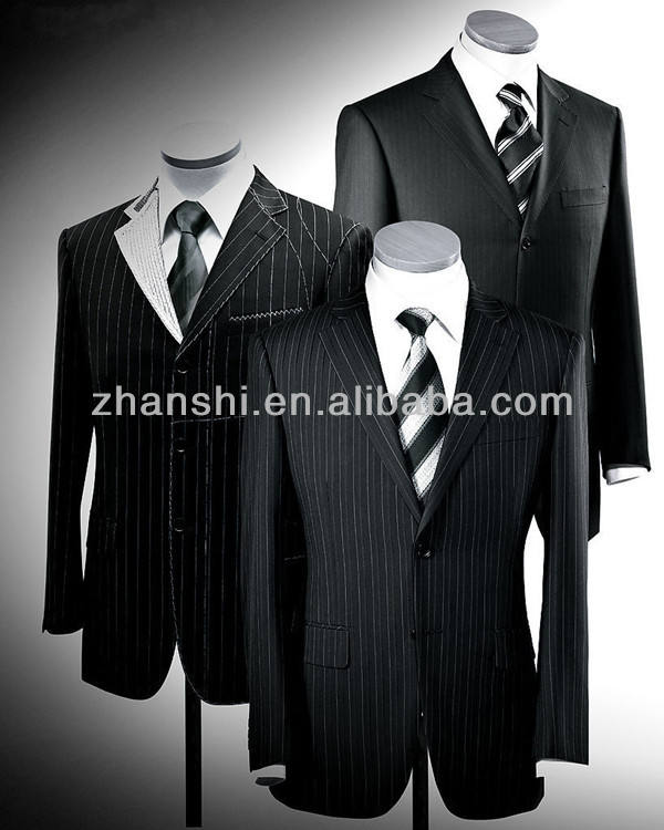 Title: The Symbolism and Significance of a Black Suit with a Red Tie