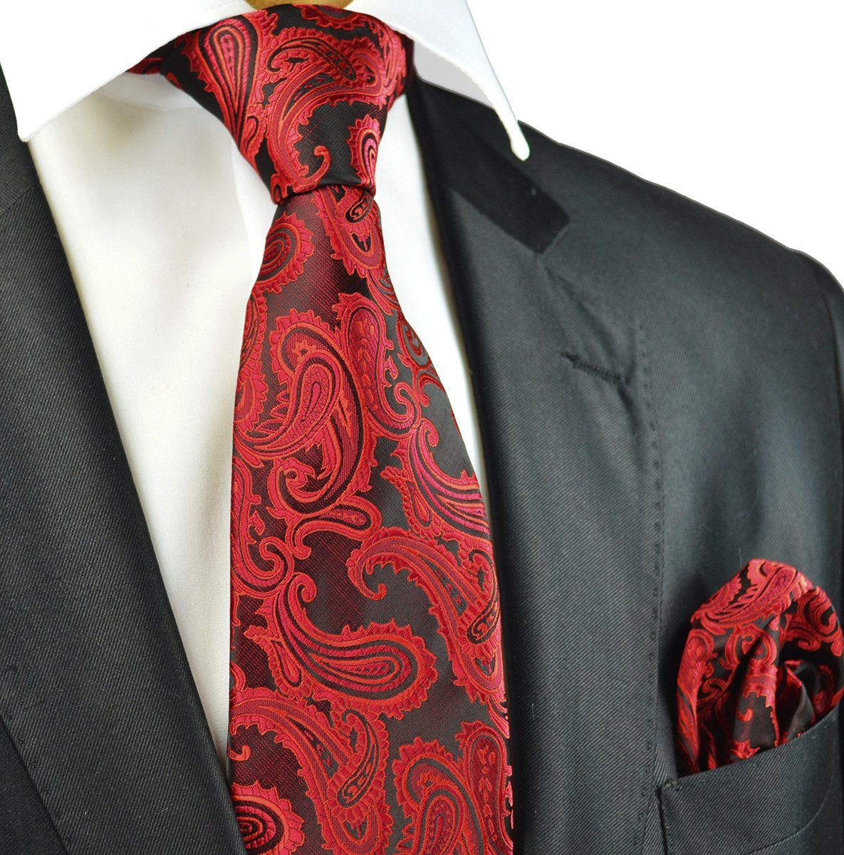 Title: The Symbolism and Significance of a Black Suit with a Red Tie