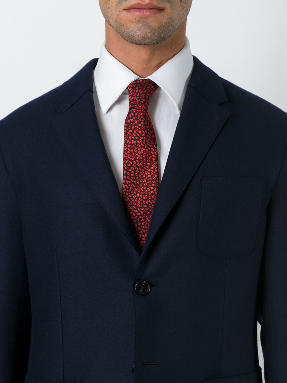 Unconventional Suit Code: The Rise of the Uncollared Tie in Professional wear