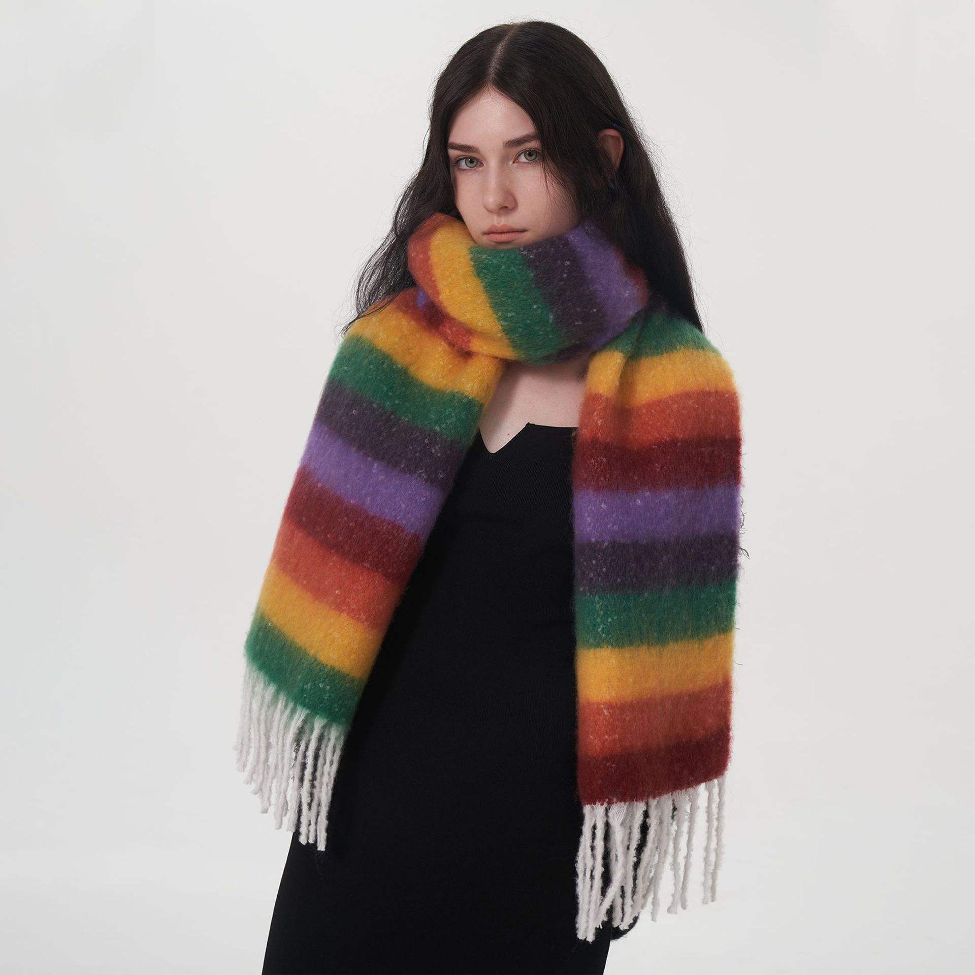 The rise of the down scarf: a winter fashion essential