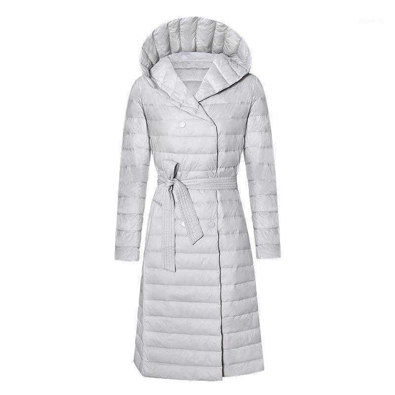 The Beauty of Long White Down Jackets in Winter