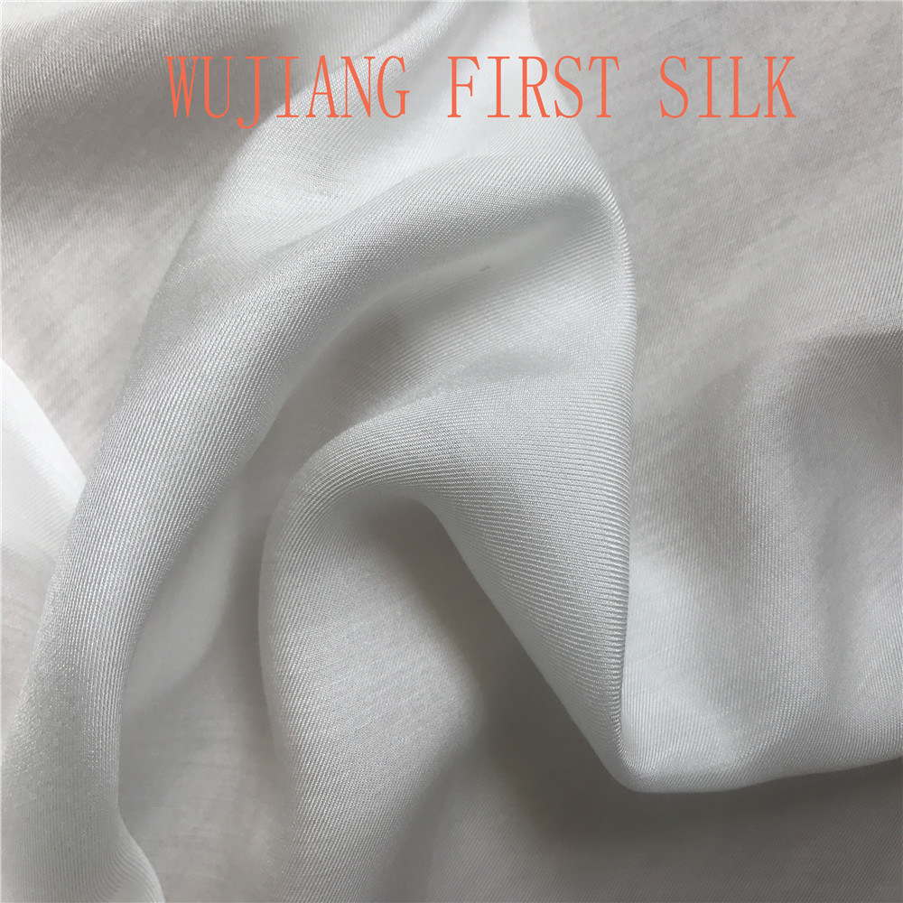 Sure, heres an English article on Suzhou Silk Scarfs: