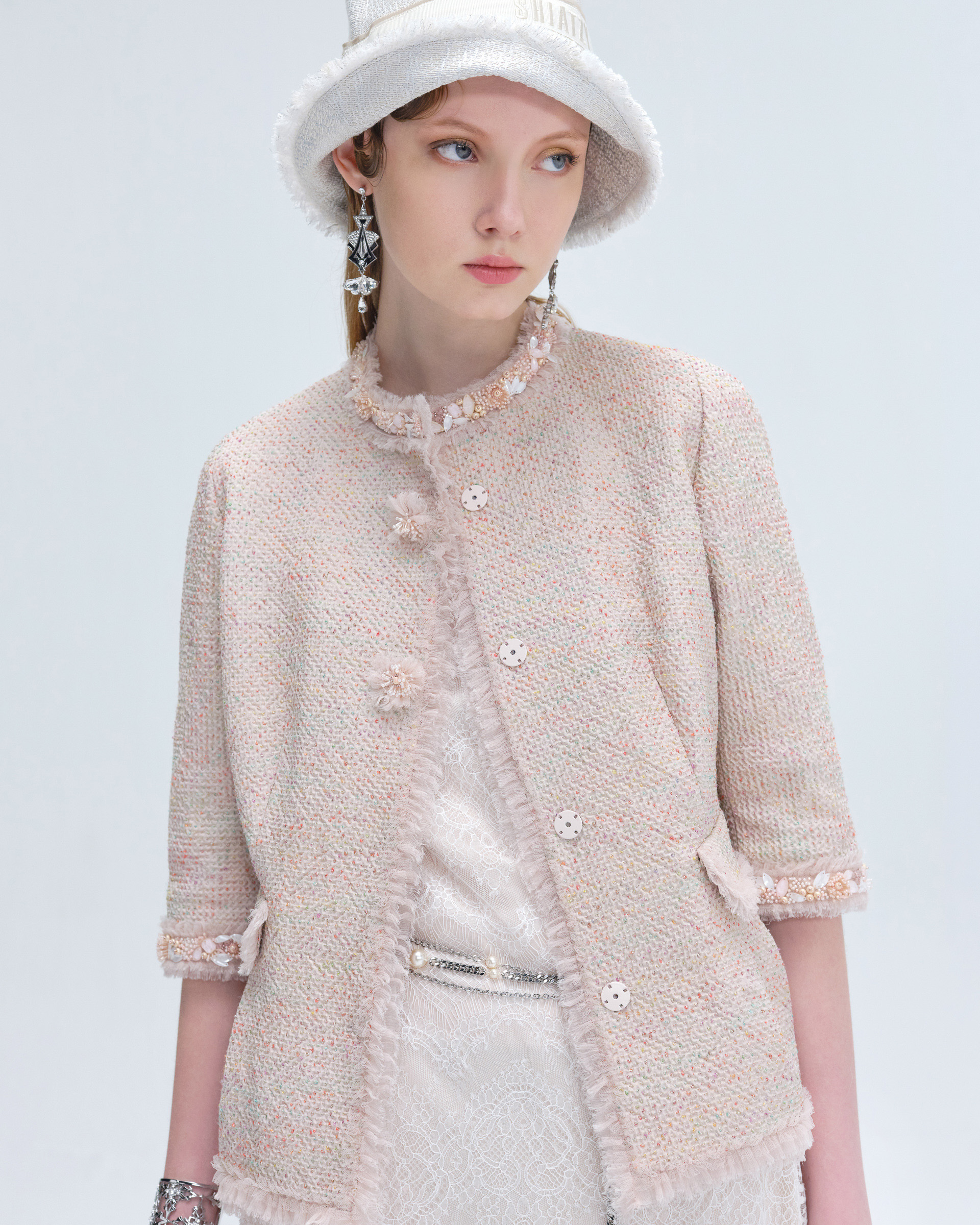 Title: Embrace the Elegance of Little Chanel with the Perfect Little Chanel Western Coat