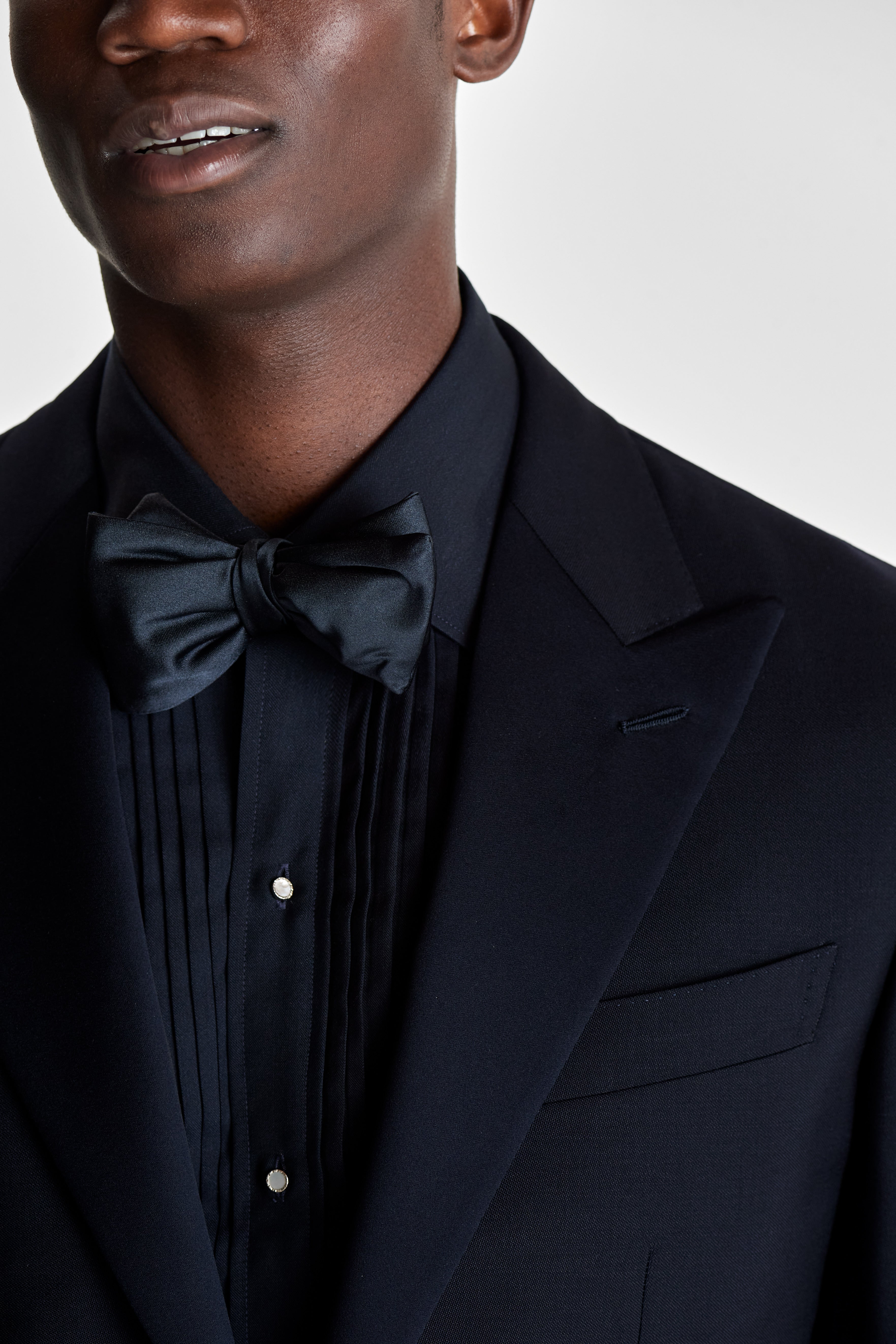 The Majesticallity of Navy Blue Suiting: An Ode to the Timeless and Stylish Wardrobe Essential