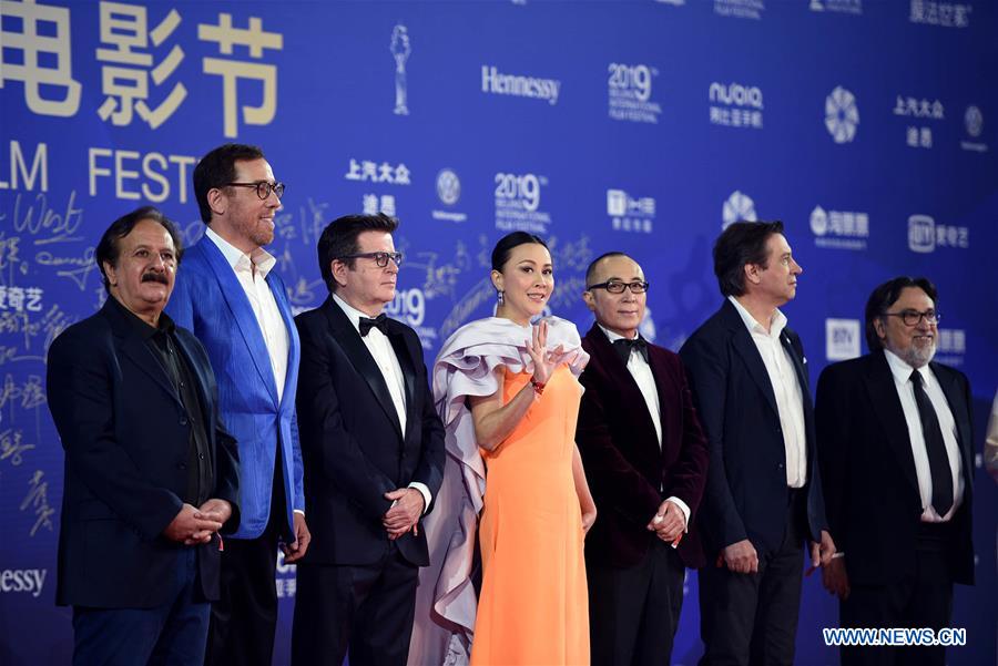 Title: A Glimpse into Yang Yangs Stylish White Suit at the Beijing Film Festival