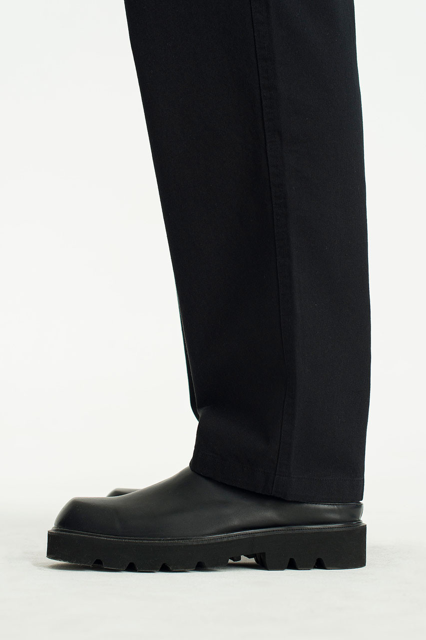 Title: The Dark Socks, Leather Suits, and High-Heeled Shoes Trend in Mens Fashion