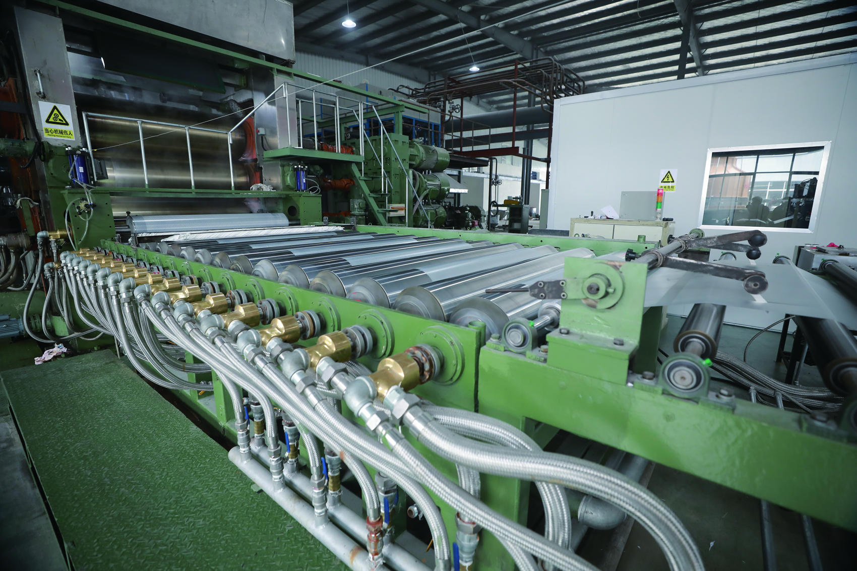 Title: The Application of PVC Carpet Lamination Machine in the Textile Industry