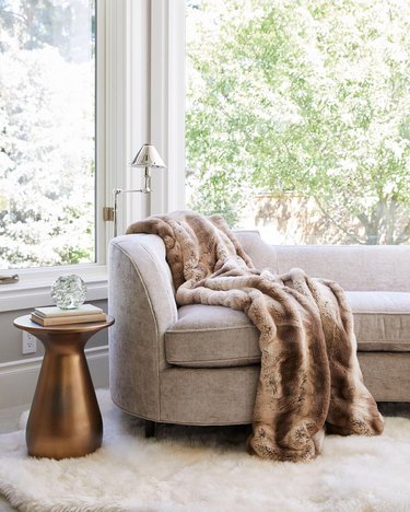 Title: The Perfect Pairing: Brown Sofa with a Trendy Window Curtain