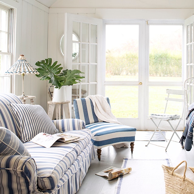 Title: The Perfect Pairing: How to Decorate Your Living Room with a Deep Blue Sofa and Window Curtains