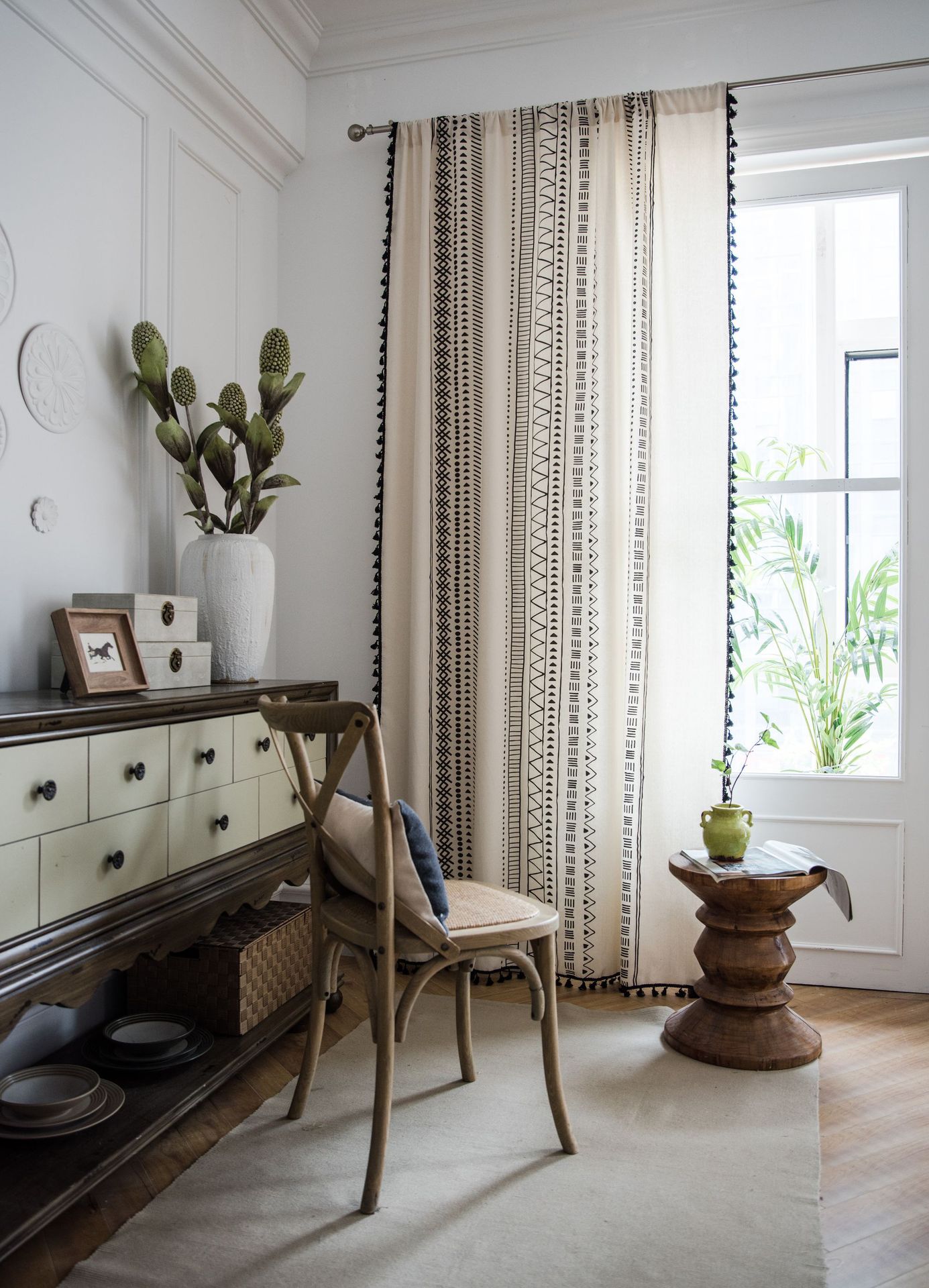 Title: The living room with caramel-colored curtains